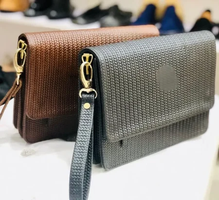 Mode Infinity Woven Clutch Bag